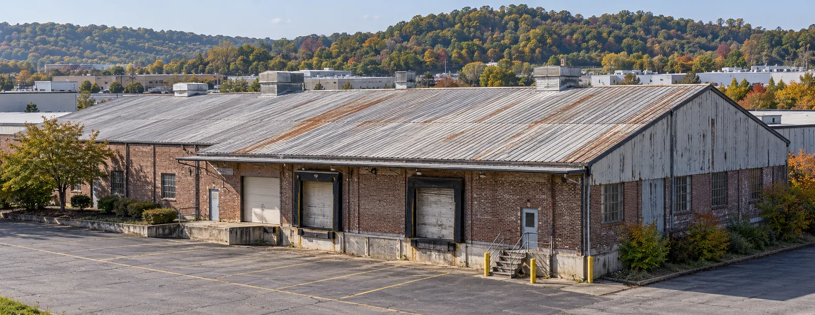 Older metal-roofed brick warehouse building in Boone County, Kentucky